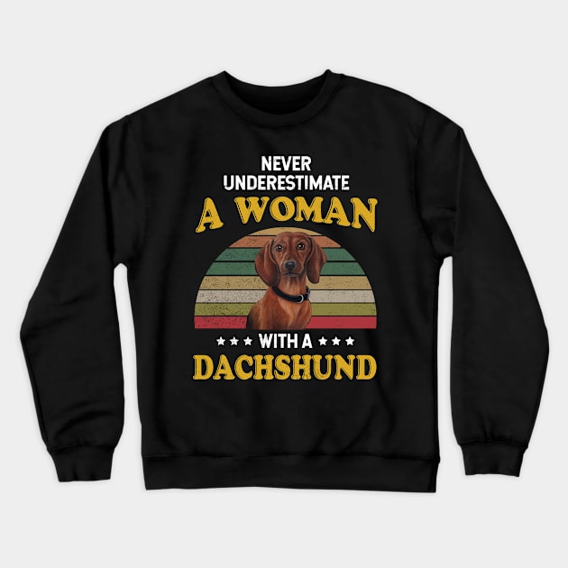 Never Underestimate A Woman With A Dachshund Crewneck Sweatshirt by Camryndougherty